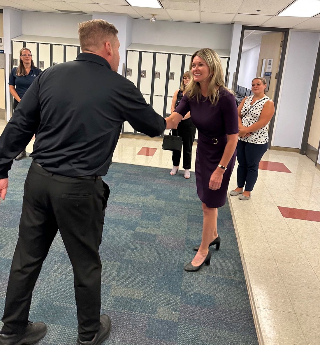 Man and woman shaking hands