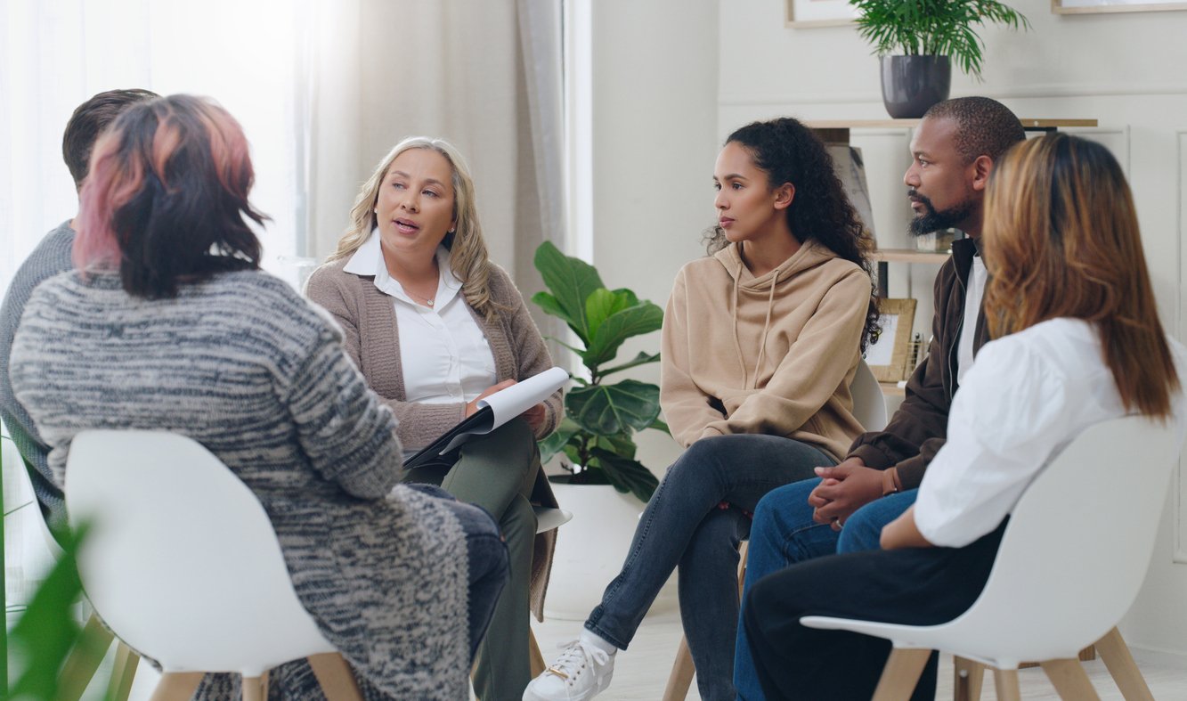 Counsellor leading group session