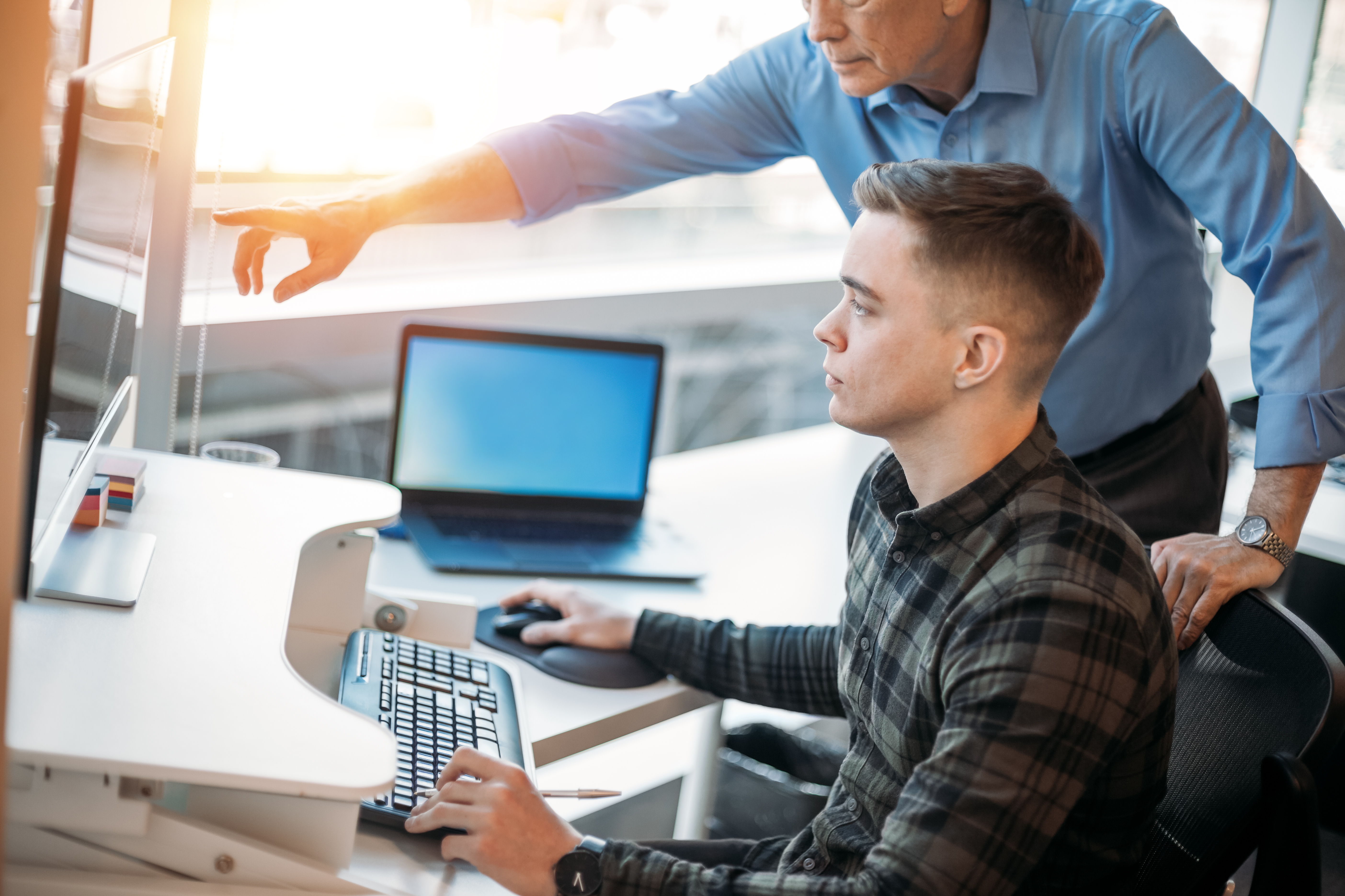 Colleague mentoring younger associate