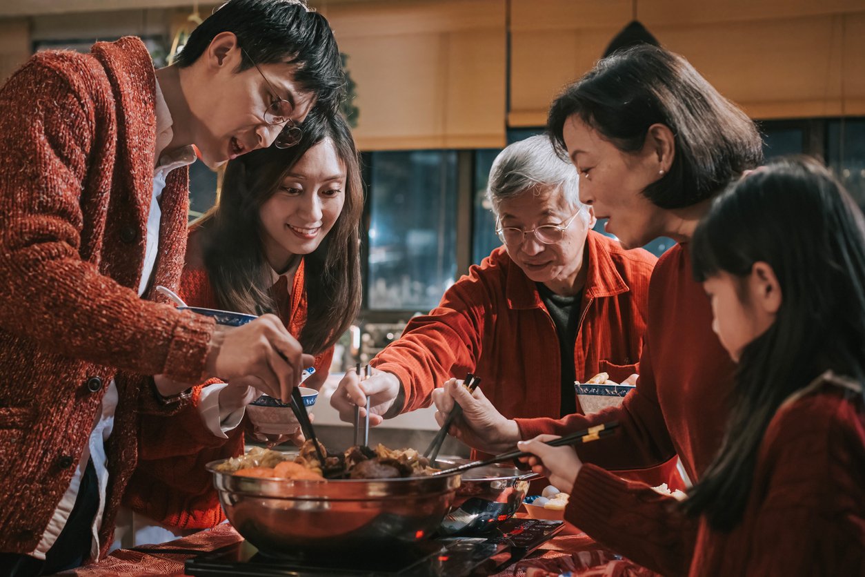 Multigenerational family enjoying dinner