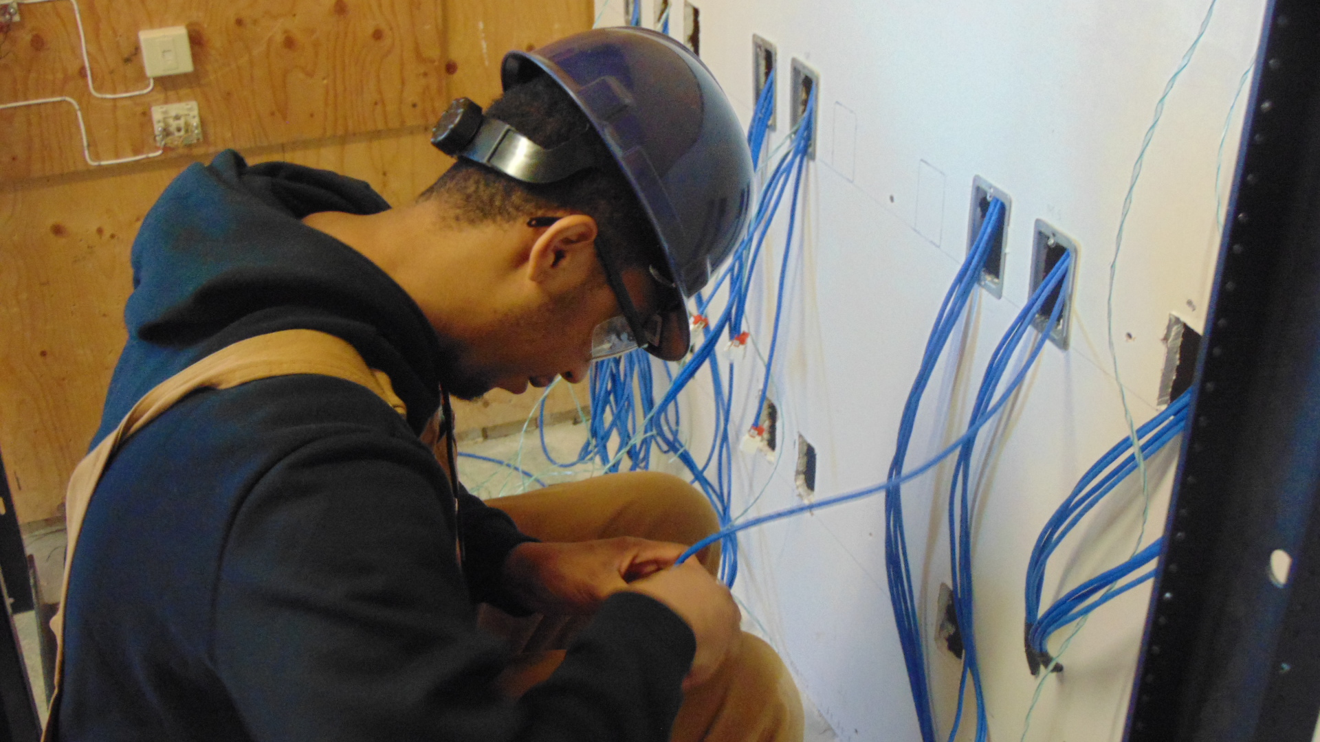 network cabling student in the workshop at Herzing College