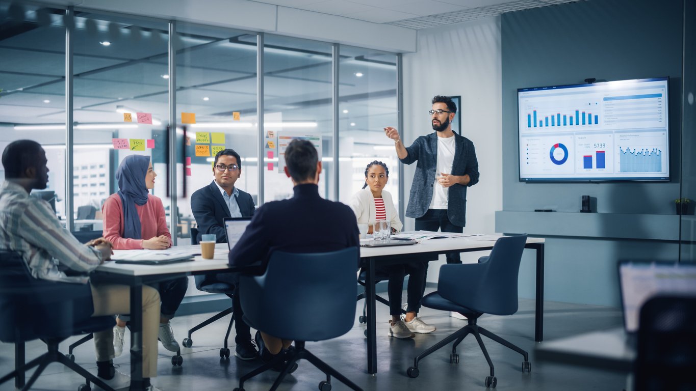 Man leading a meeting in an office