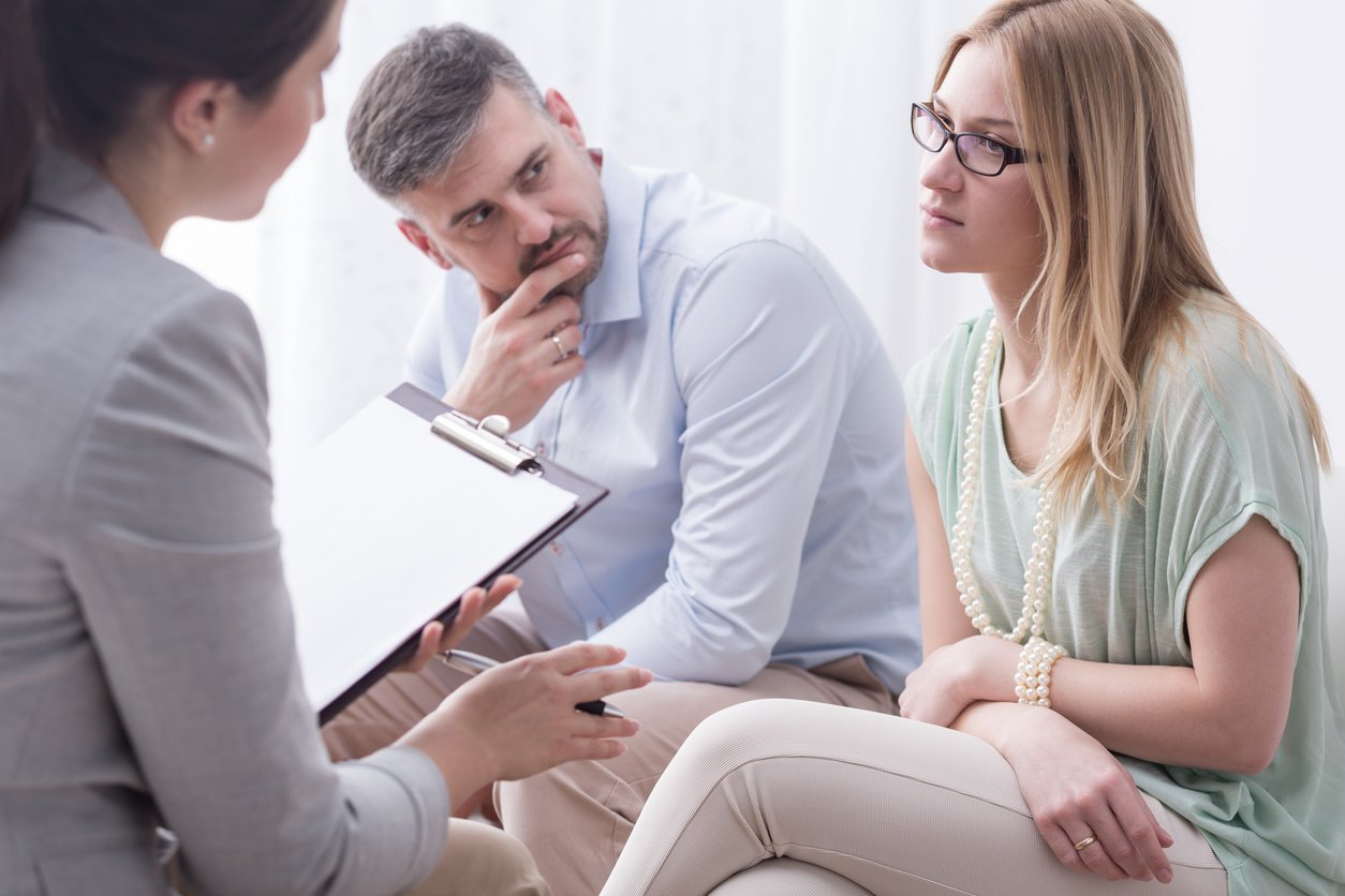 Disputing couple talking to mediator