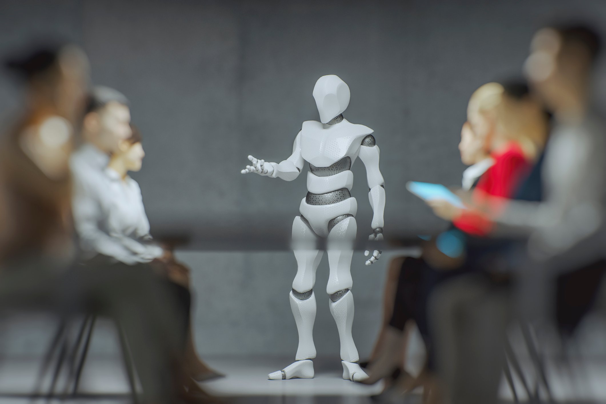 Humanoid robot talking to a group of people