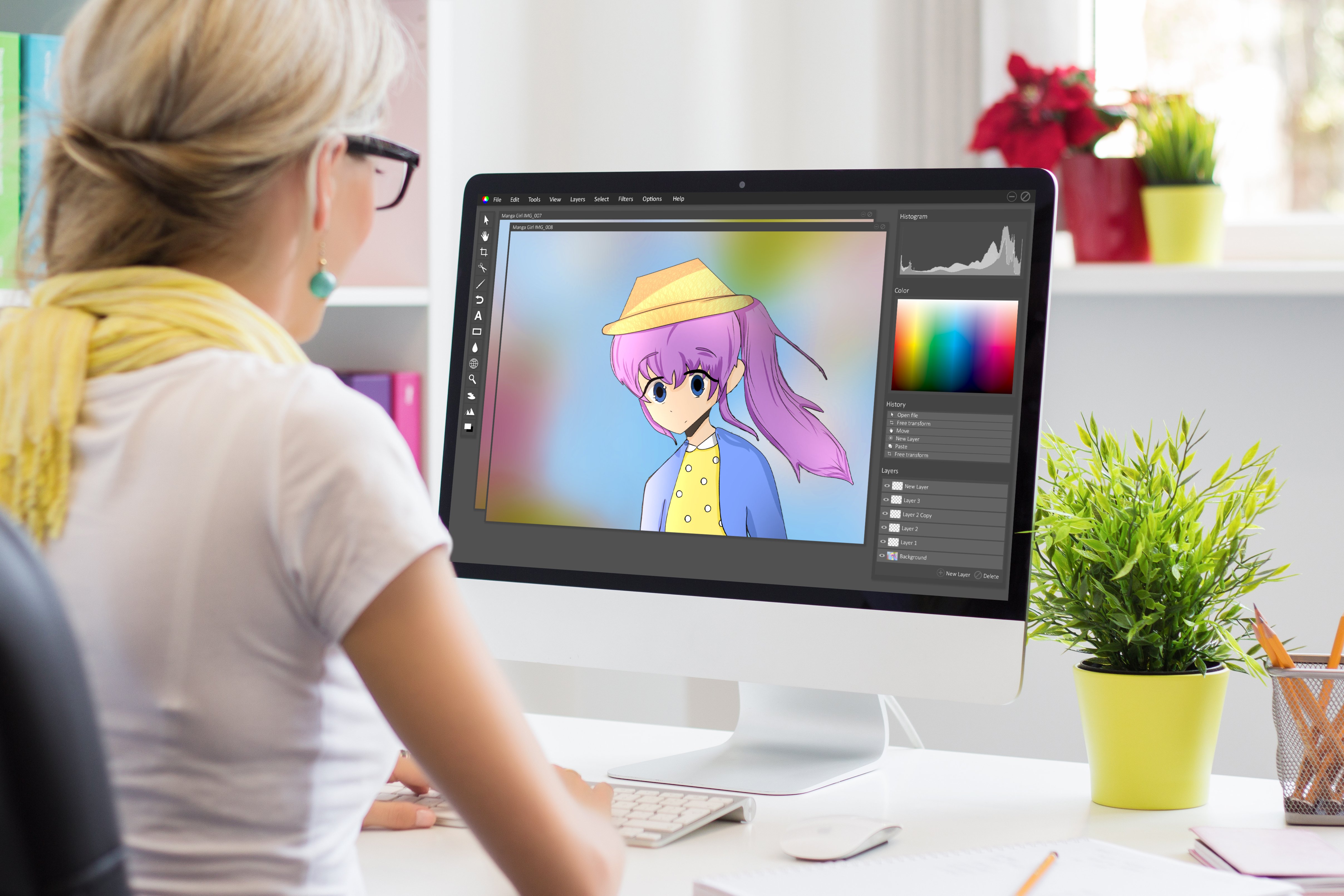 An animator drawing a character in image editing software