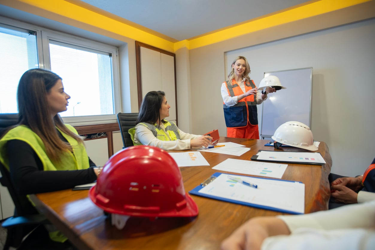 Health and safety officer leading a safety workshop