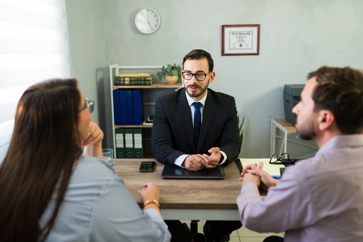 Arbitrator talking with clients