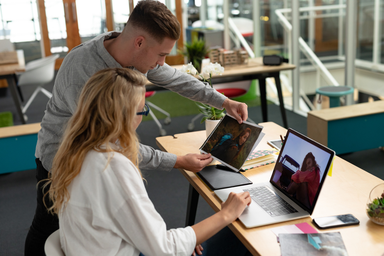 Man and woman looking at computer screen