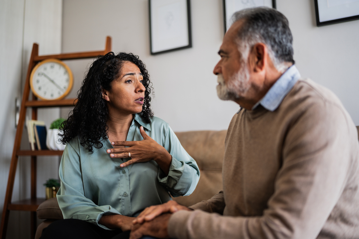 Senior man listening to adult daughter