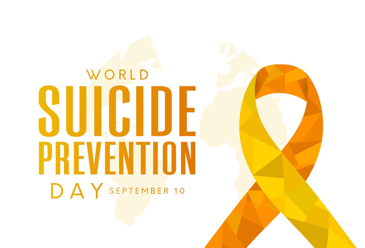 Yellow ribbon and suicide prevention day text